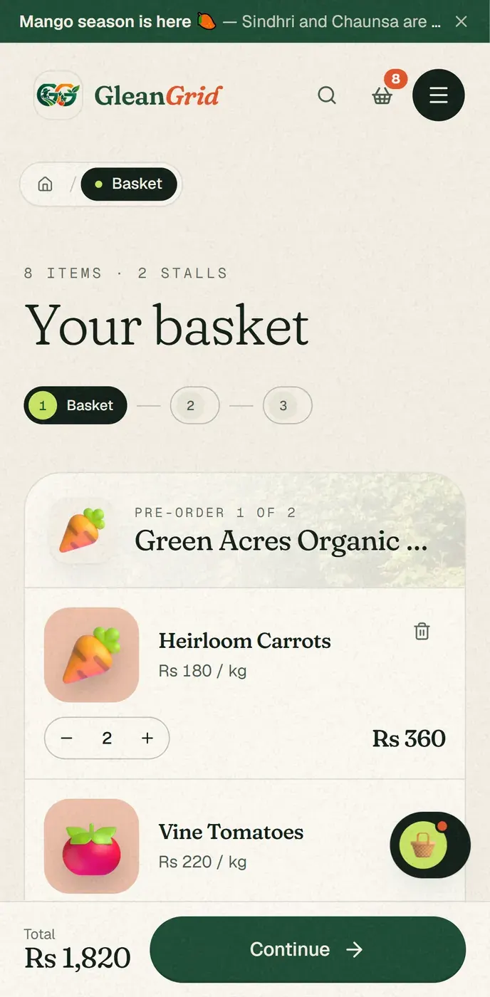 Mobile — the basket grouped by stall with a sticky total