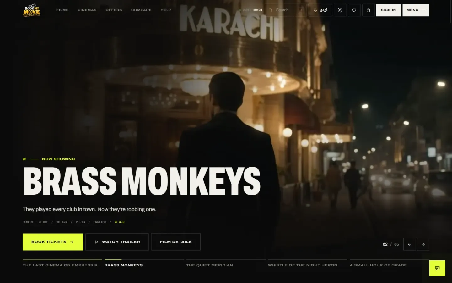 BookMyMovie's home page: a trailer plays silently behind the featured film, with Book tickets, Watch trailer and Film details, and the next films in the rotation along the bottom.